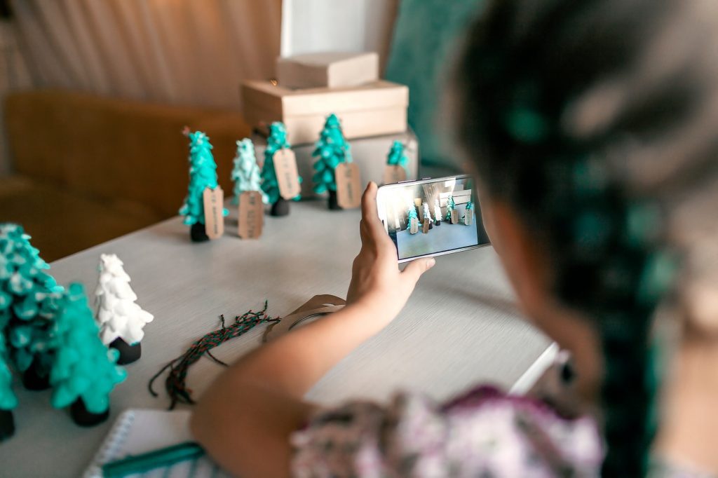 Girl prepared DIY gifts and making photo to share with family, zero waste