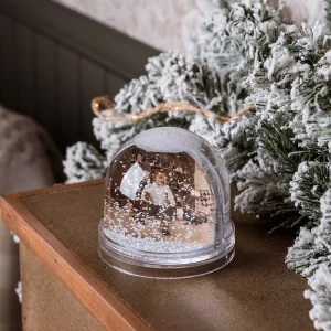 El globo de nieve de Navidad personalizado con fotografía es un clásico que nunca pierde encanto.